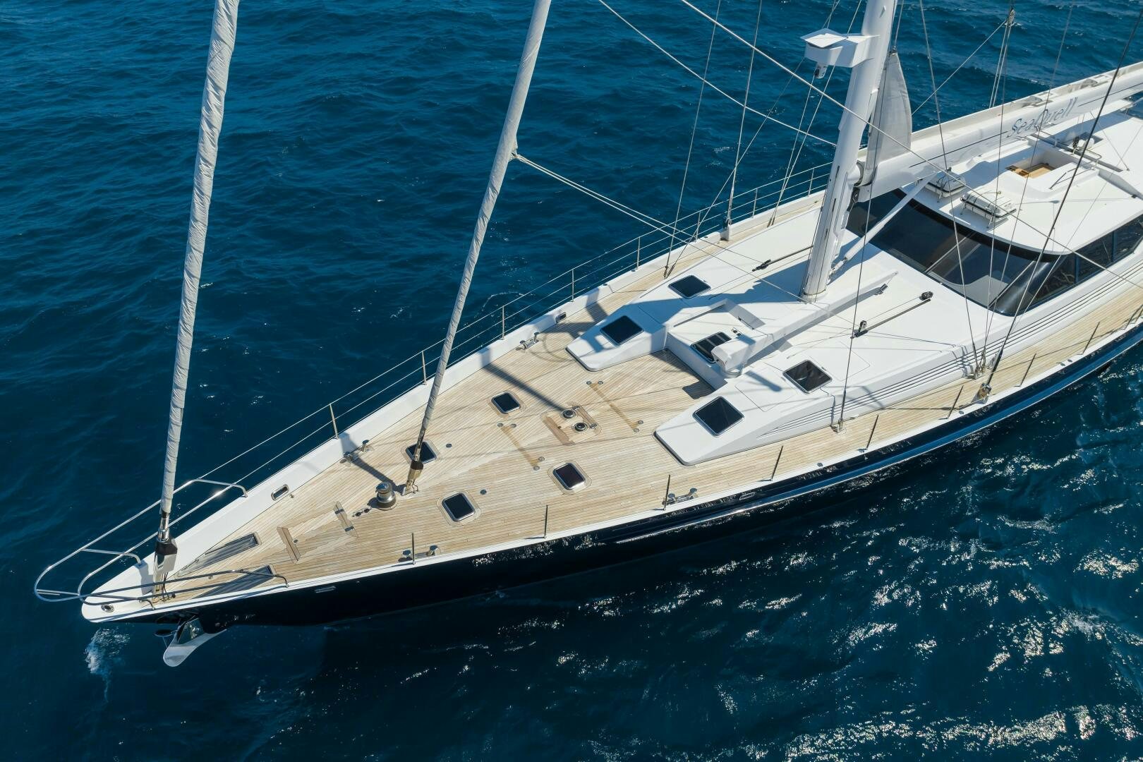 a white boat on the water aboard SEAQUELL Yacht for Sale