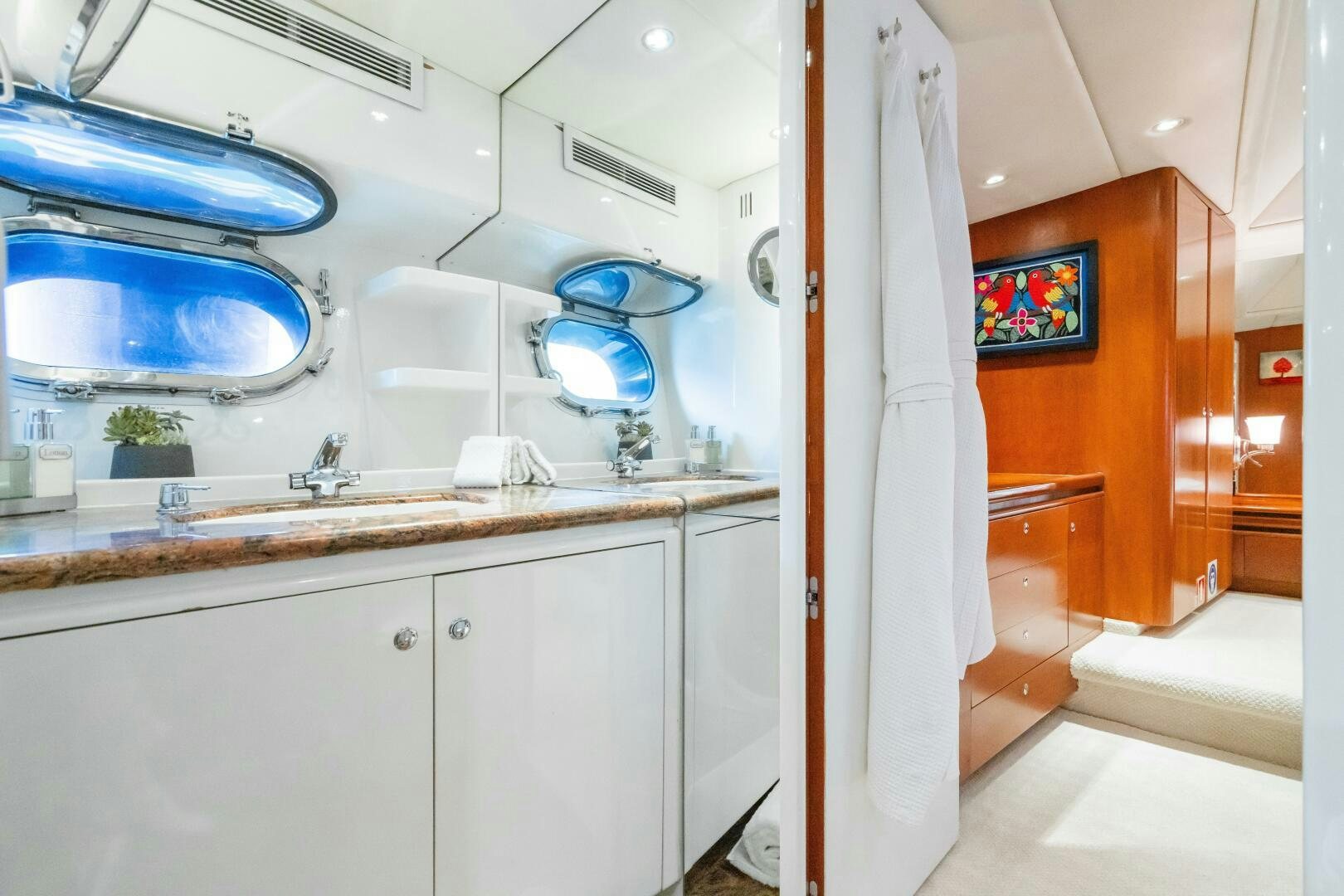 a kitchen with a sink and a television aboard SEAQUELL Yacht for Sale