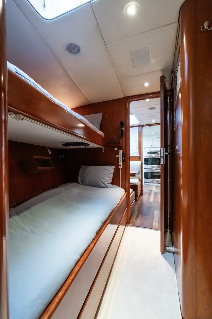 a room with a bed and a hallway aboard SEAQUELL Yacht for Sale