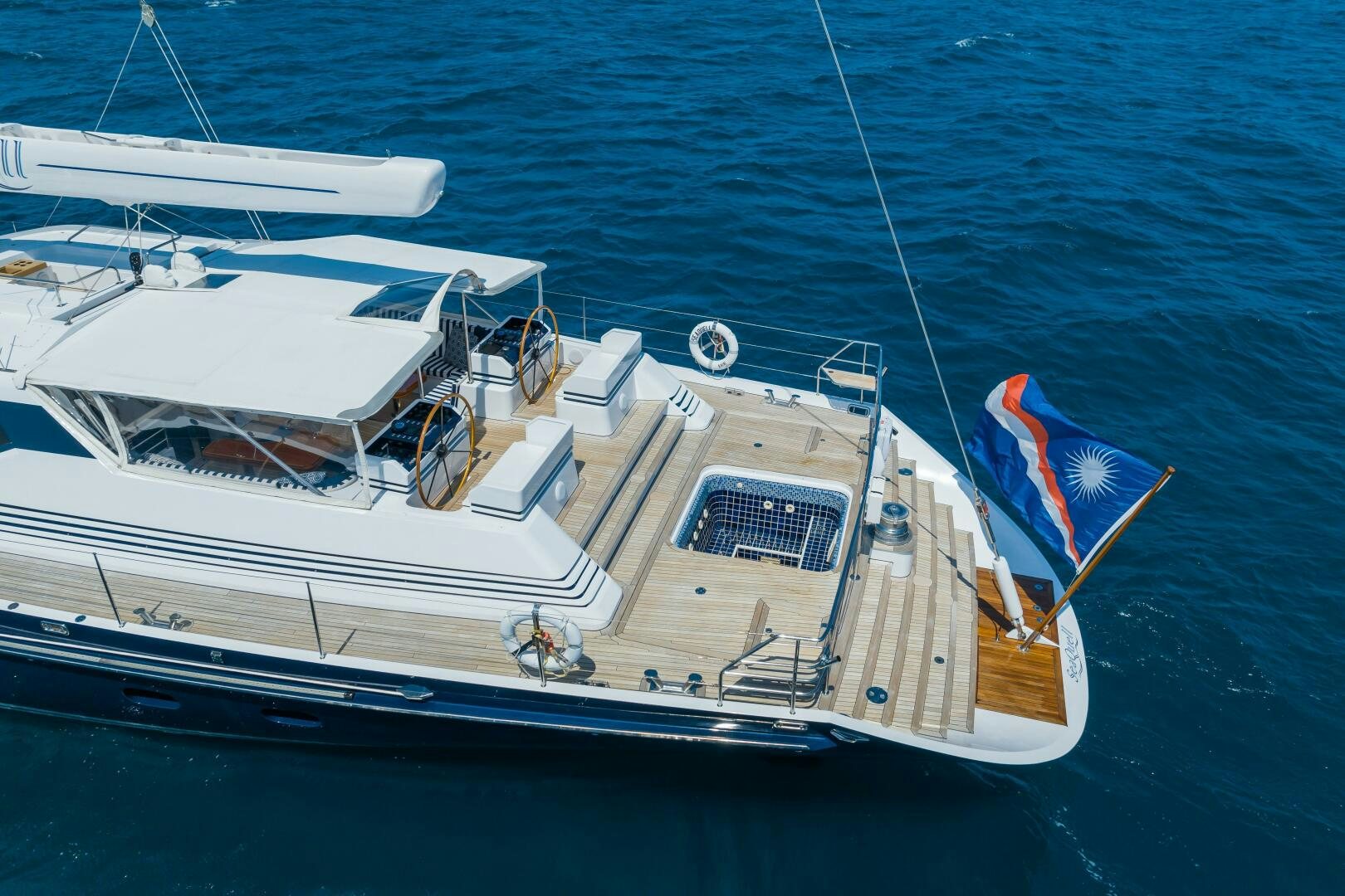 a boat with a lifeguard stand on the deck aboard SEAQUELL Yacht for Sale