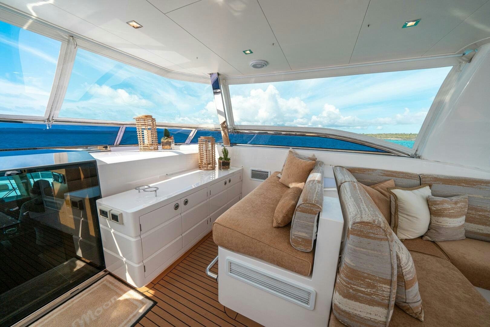 a room with a bed and a sofa aboard MIDNIGHT MOON Yacht for Sale