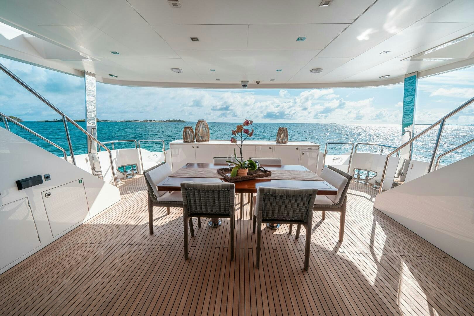 a table and chairs on a boat aboard MIDNIGHT MOON Yacht for Sale