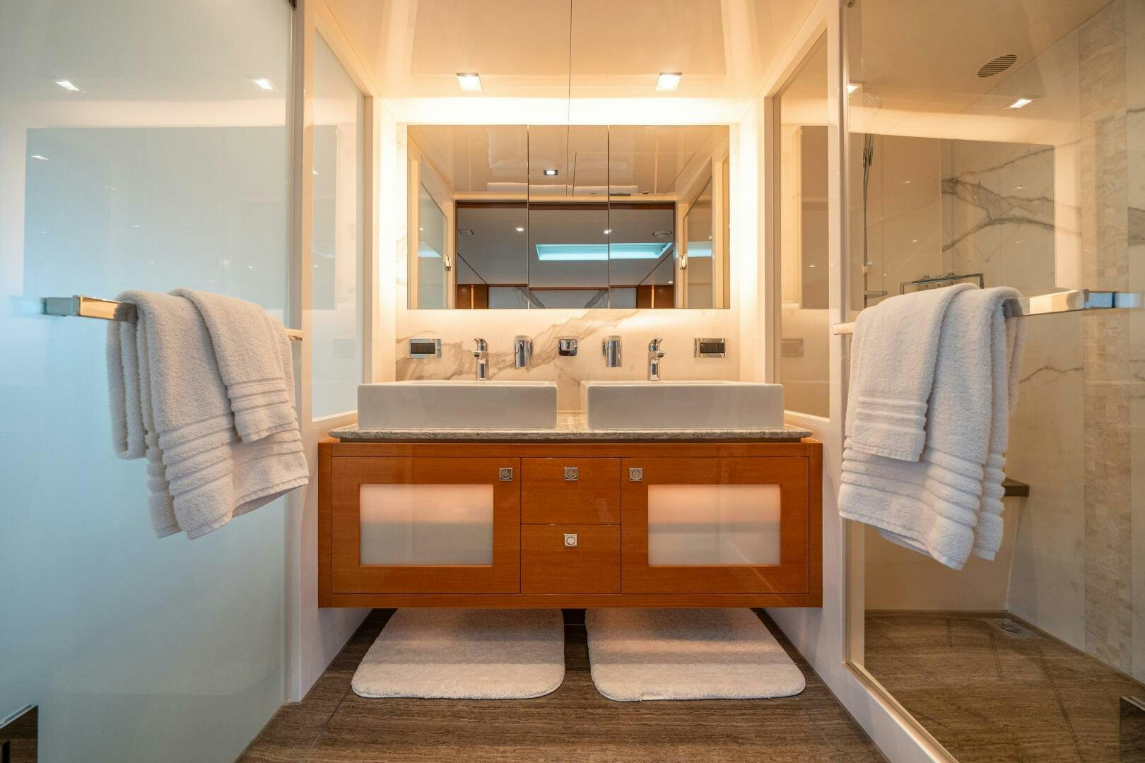 a bathroom with a sink and a mirror aboard MIDNIGHT MOON Yacht for Sale