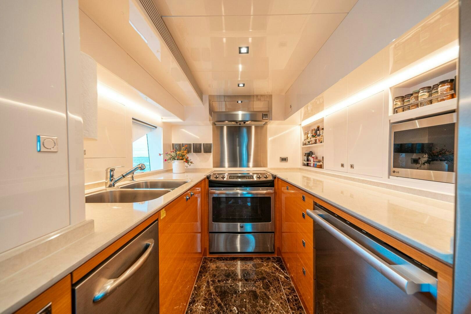 a kitchen with a stove and oven aboard MIDNIGHT MOON Yacht for Sale