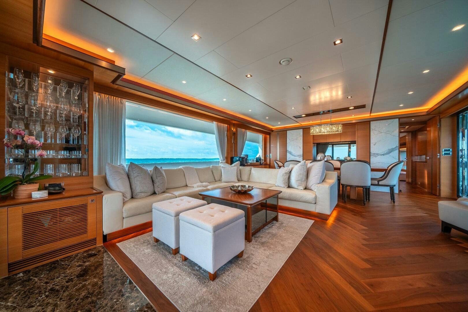 a living room with a large window aboard MIDNIGHT MOON Yacht for Sale