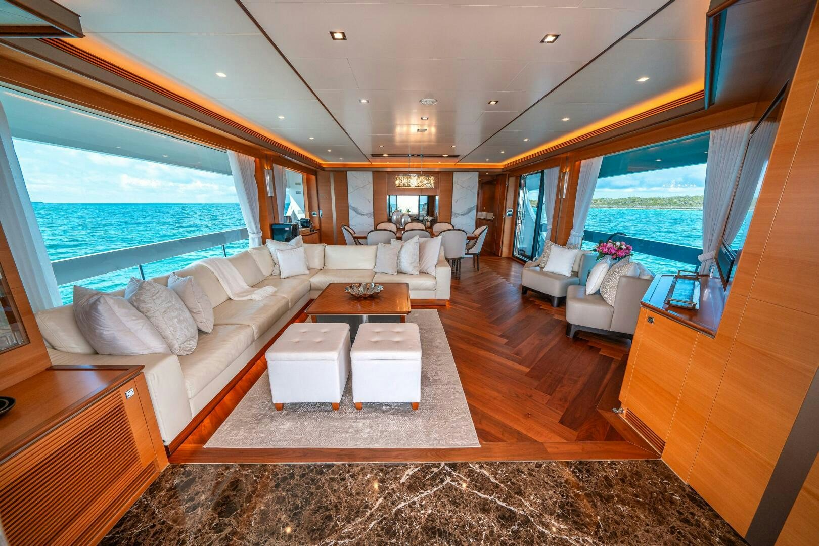 a living room with a large window aboard MIDNIGHT MOON Yacht for Sale