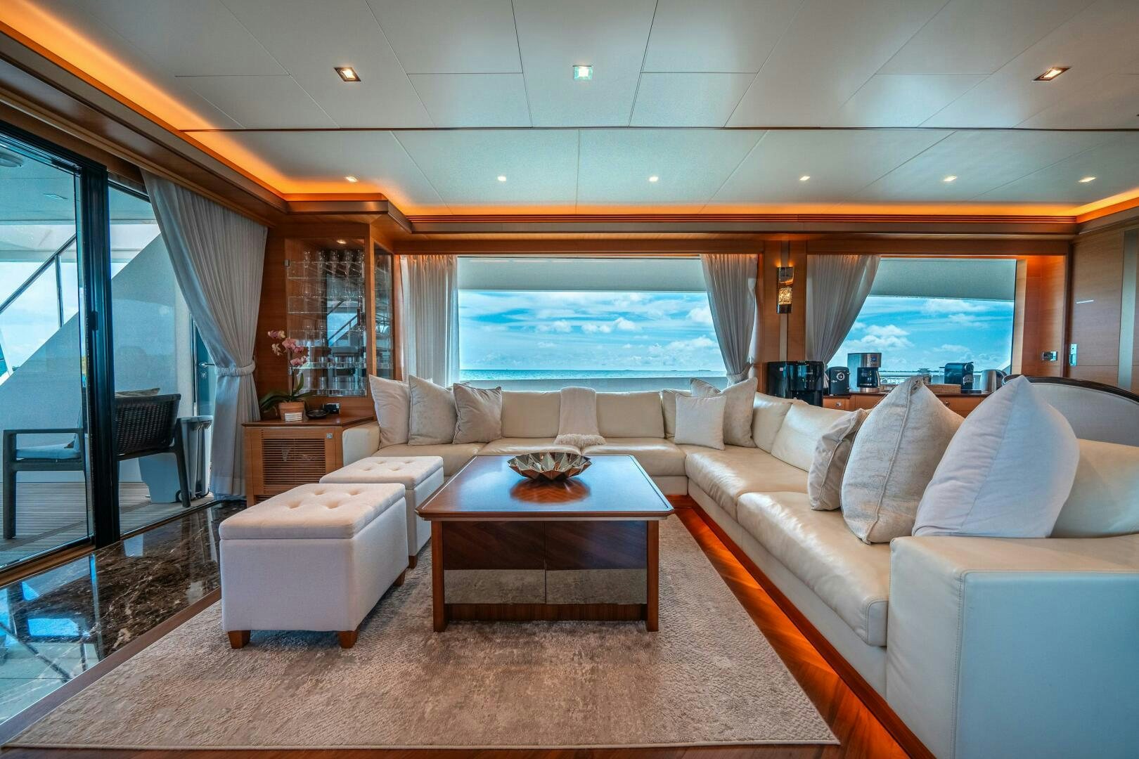 a living room with a large window aboard MIDNIGHT MOON Yacht for Sale