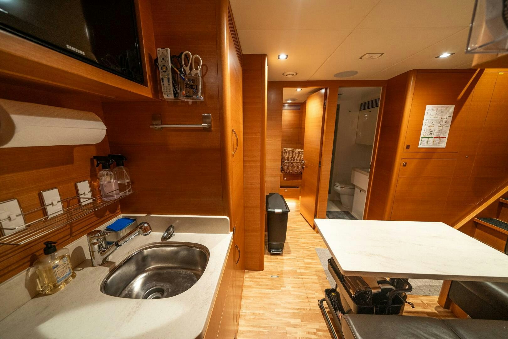 a kitchen with a sink and cabinets aboard MIDNIGHT MOON Yacht for Sale