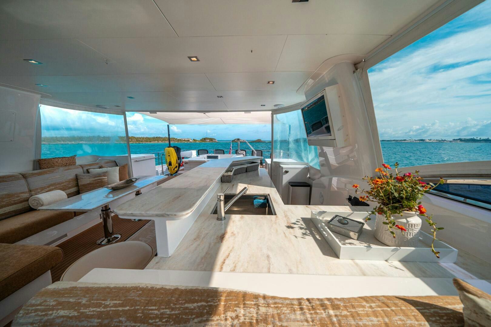inside of a building with a large window overlooking the ocean aboard MIDNIGHT MOON Yacht for Sale