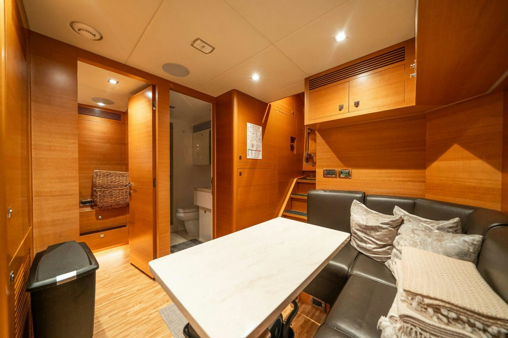 a room with a couch and a table aboard MIDNIGHT MOON Yacht for Sale