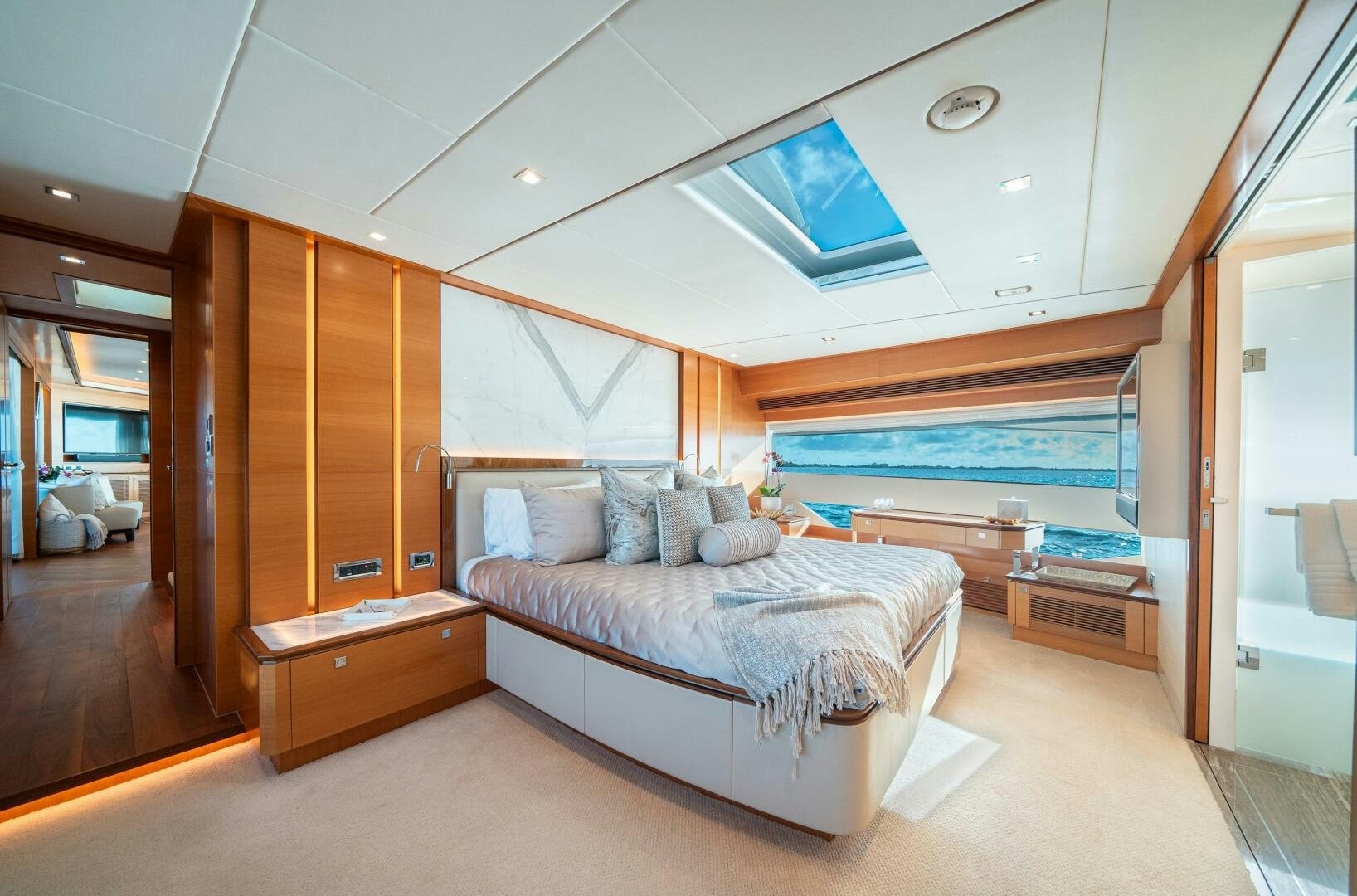 a bedroom with a large bed aboard MIDNIGHT MOON Yacht for Sale