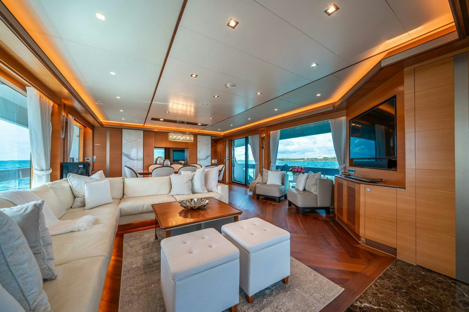 a living room with a large window aboard MIDNIGHT MOON Yacht for Sale