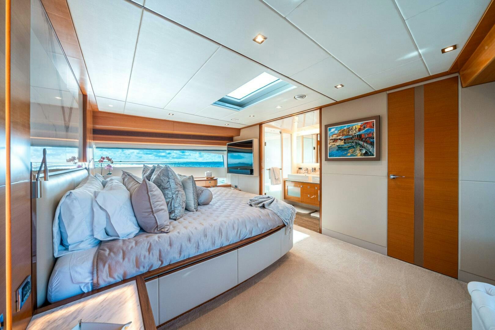 a bedroom with a bed aboard MIDNIGHT MOON Yacht for Sale