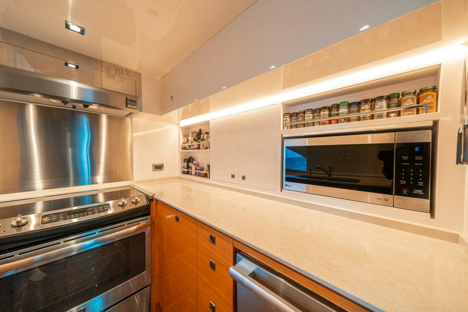 a kitchen with a stainless steel oven aboard MIDNIGHT MOON Yacht for Sale