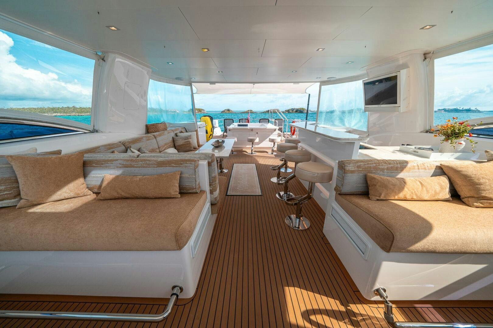 a living room with a large window aboard MIDNIGHT MOON Yacht for Sale