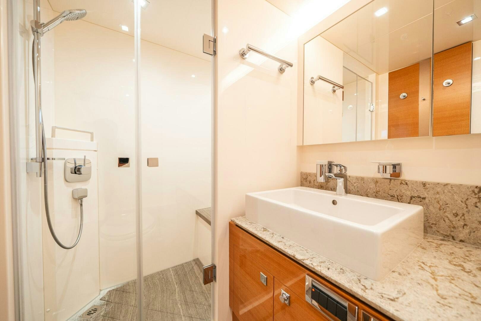 a bathroom with a shower unit and sink aboard MIDNIGHT MOON Yacht for Sale