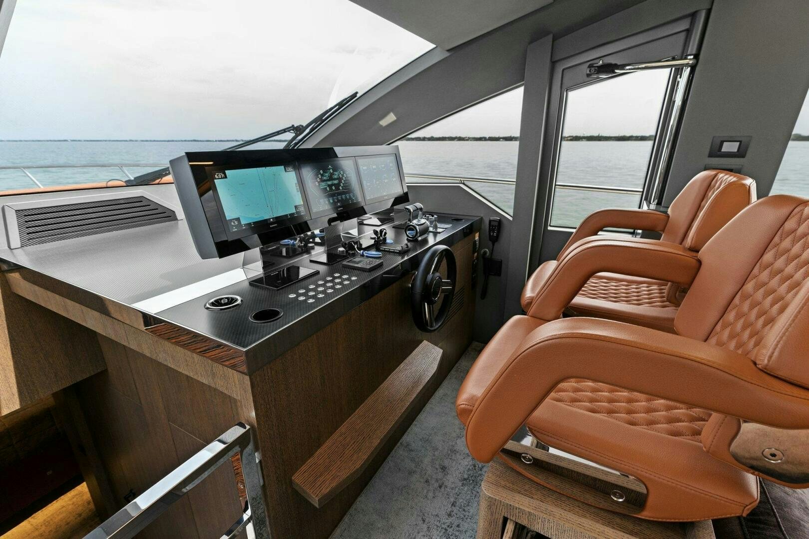 a room with a desk and computer aboard TINKA BUNNY Yacht for Sale