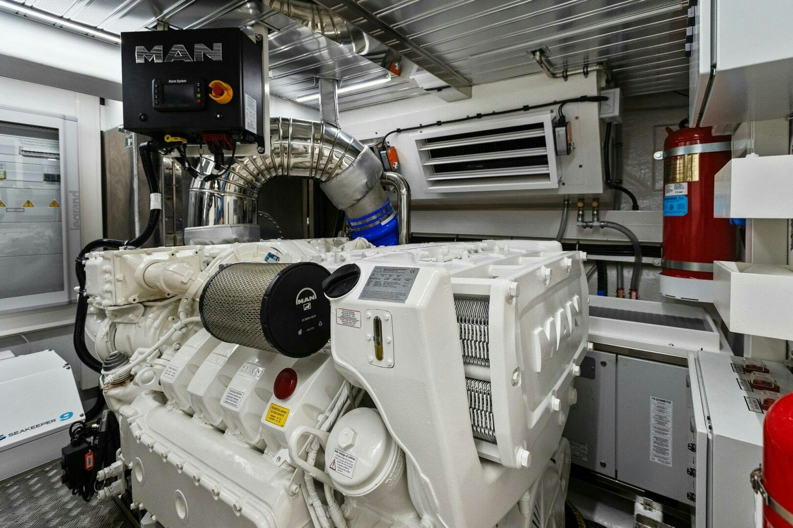 a machine in a room aboard TINKA BUNNY Yacht for Sale