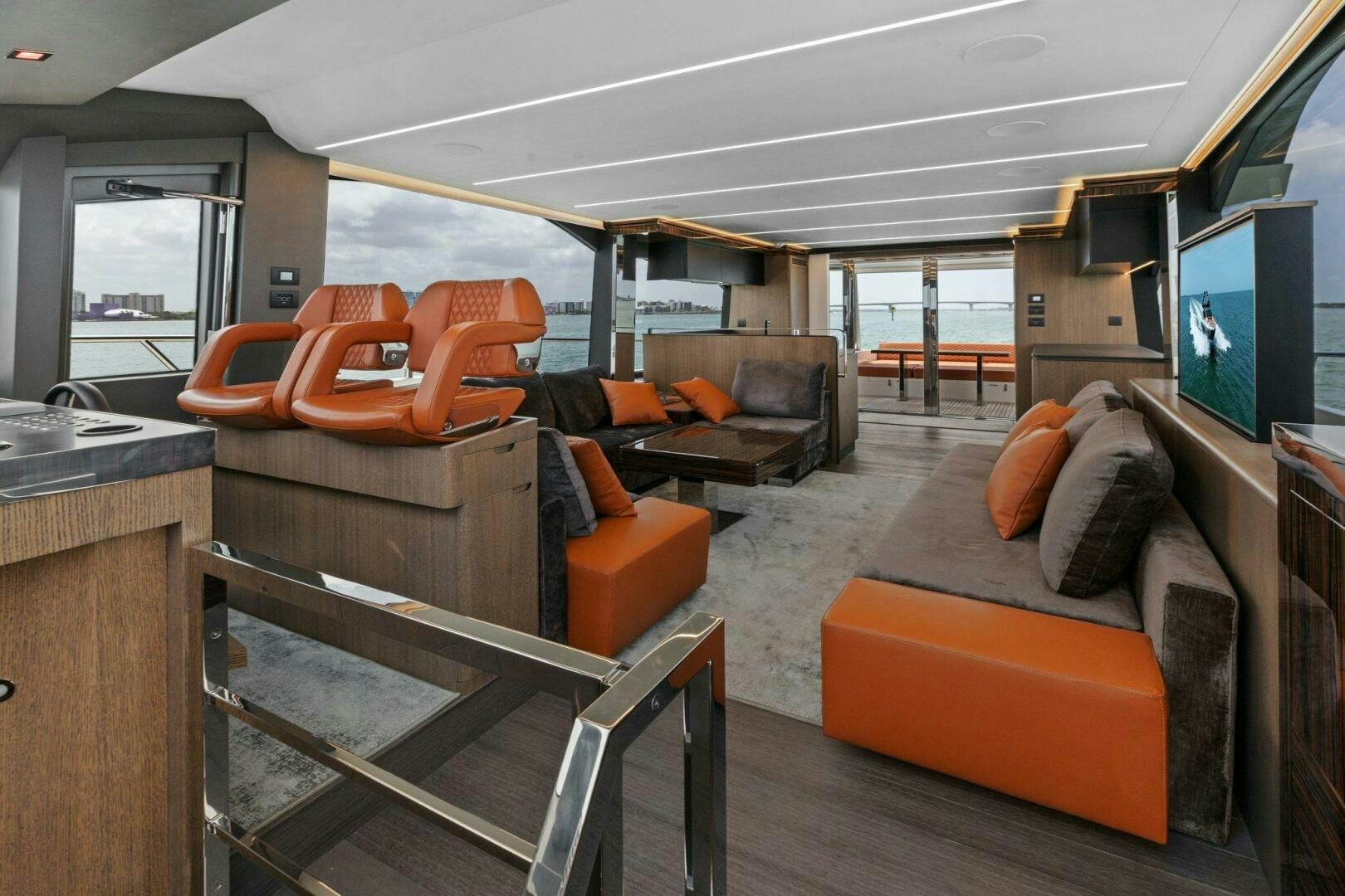 a living room with a couch and a tv aboard TINKA BUNNY Yacht for Sale