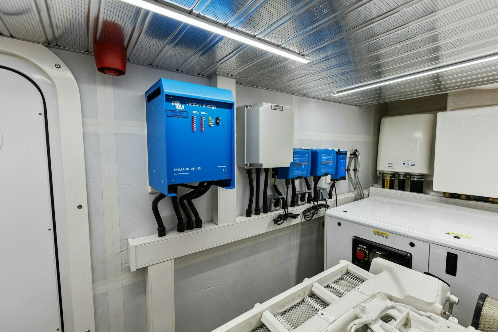 a room with several machines aboard TINKA BUNNY Yacht for Sale