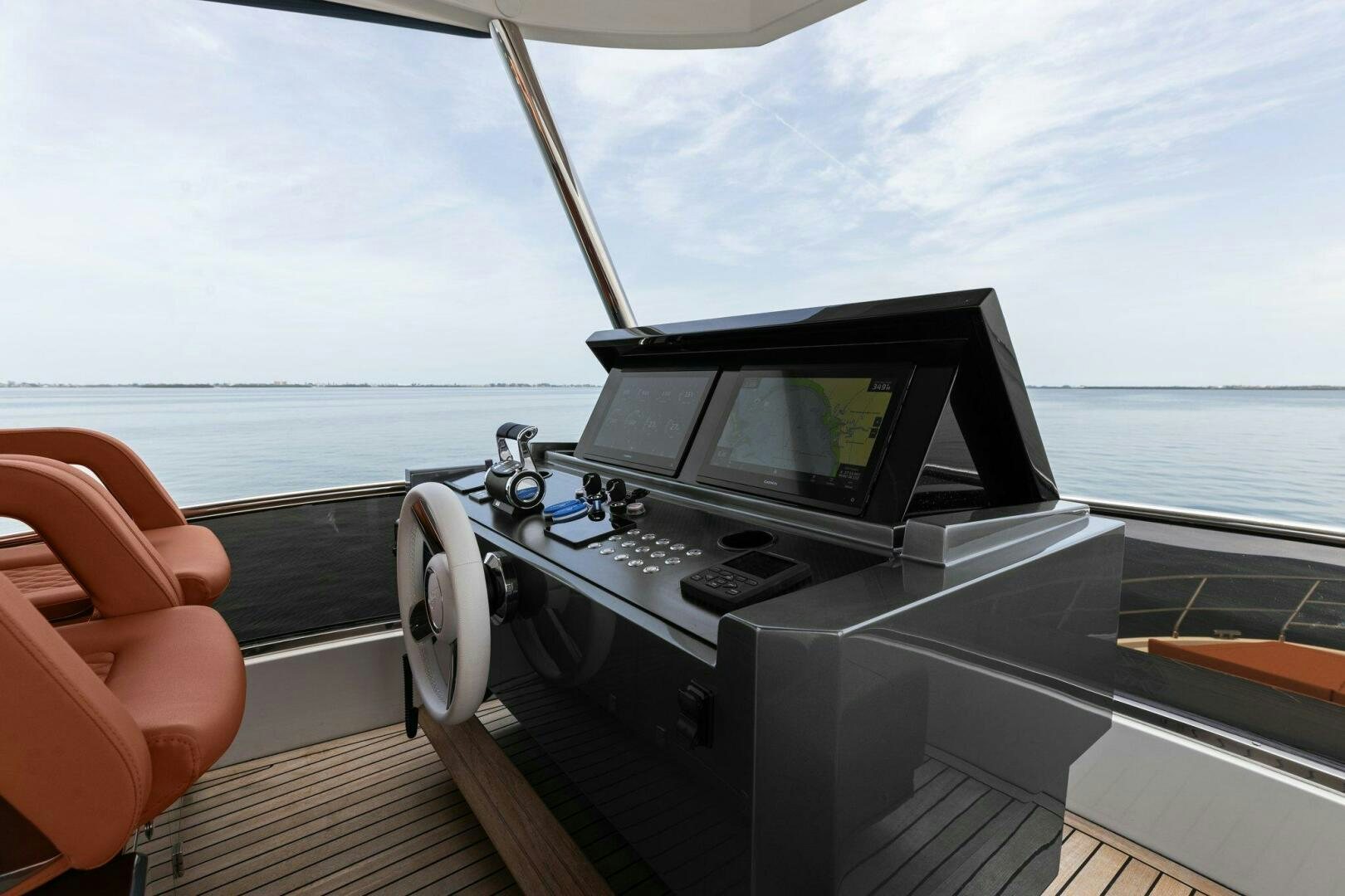 a boat with a computer monitor on the deck aboard TINKA BUNNY Yacht for Sale