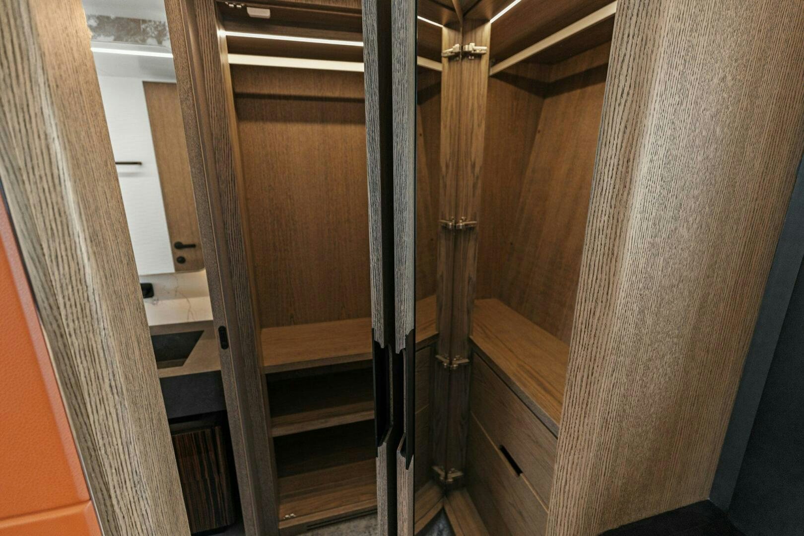 a room with wooden walls and a staircase aboard TINKA BUNNY Yacht for Sale