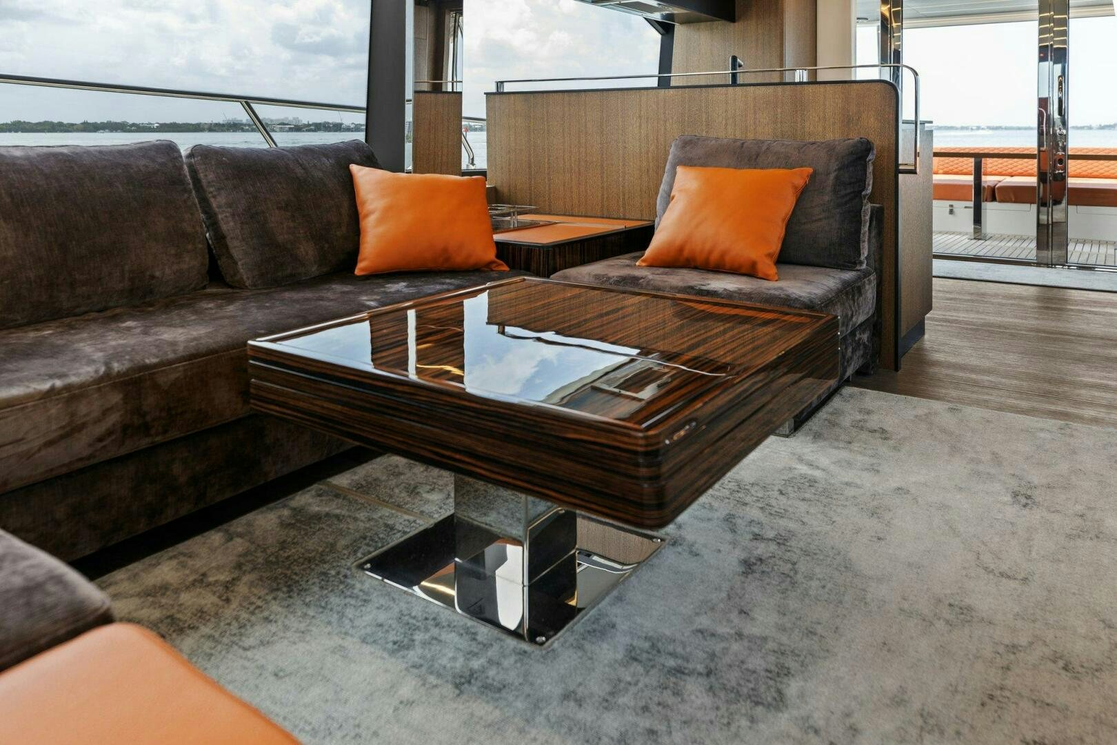 a couch with a coffee table aboard TINKA BUNNY Yacht for Sale