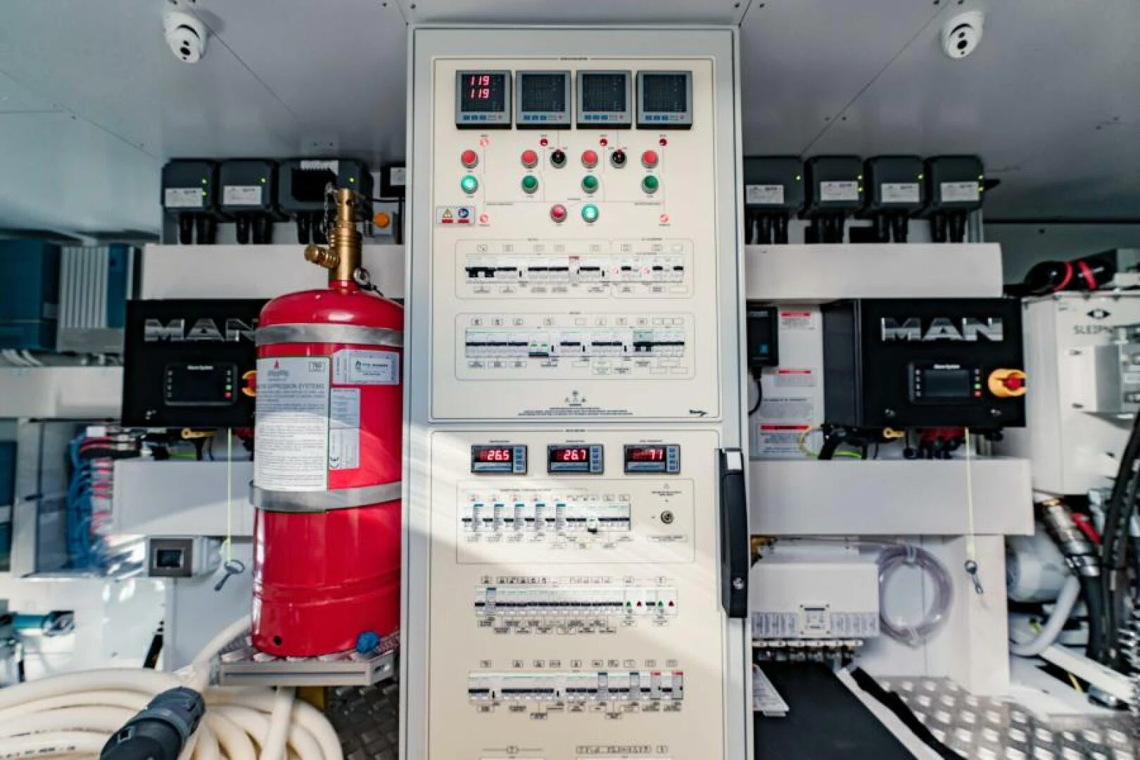 a computer tower with a red and white display aboard INEA Yacht for Sale