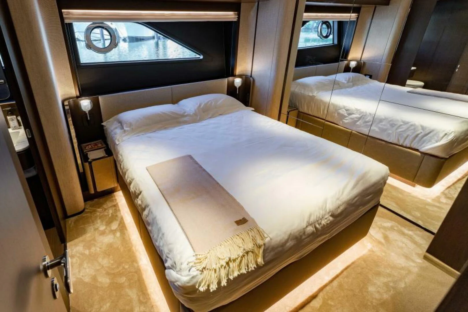 a room with two beds aboard INEA Yacht for Sale