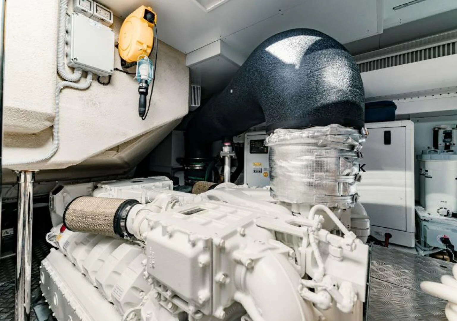 a person wearing a hard hat and working in a factory aboard INEA Yacht for Sale