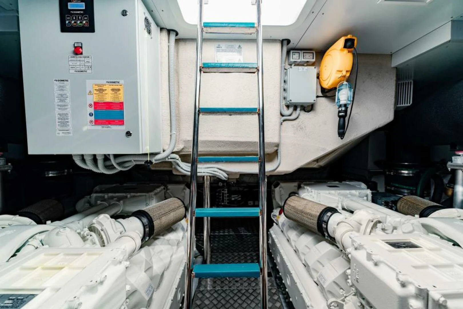 a machine with a yellow helmet aboard INEA Yacht for Sale