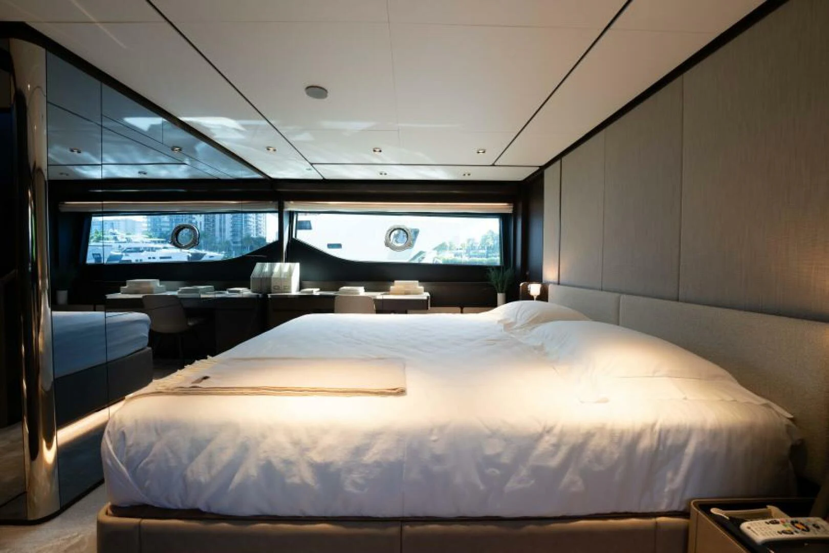 a room with a bed and a window aboard INEA Yacht for Sale