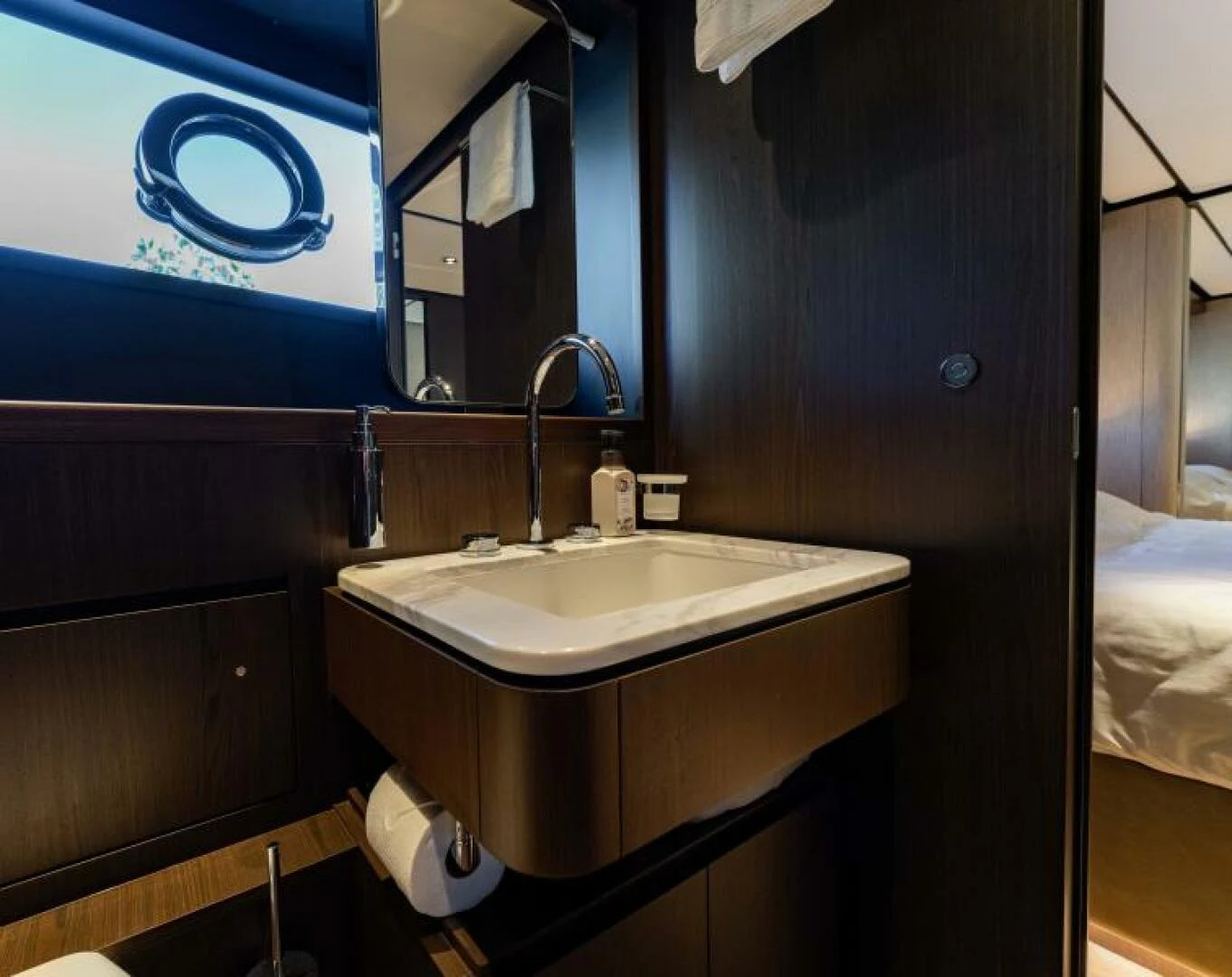 a bathroom with a sink and a mirror aboard INEA Yacht for Sale