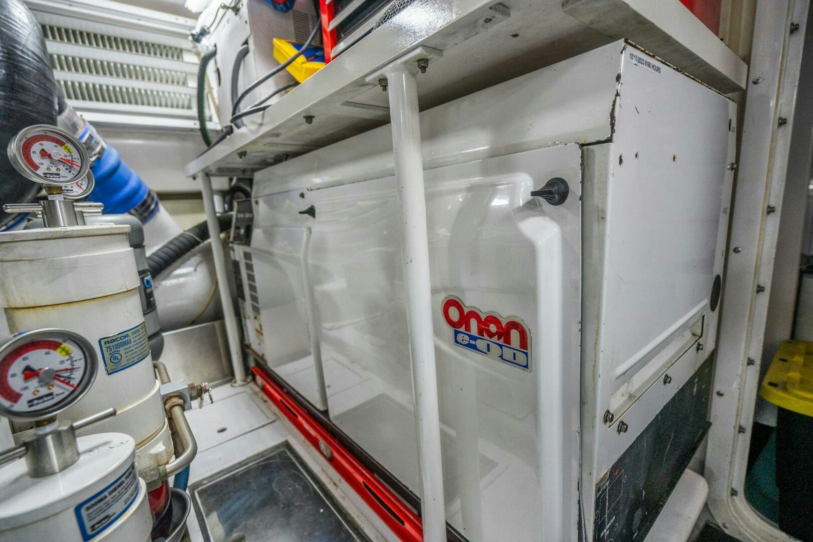 a white machine with a white handle aboard W Yacht for Sale