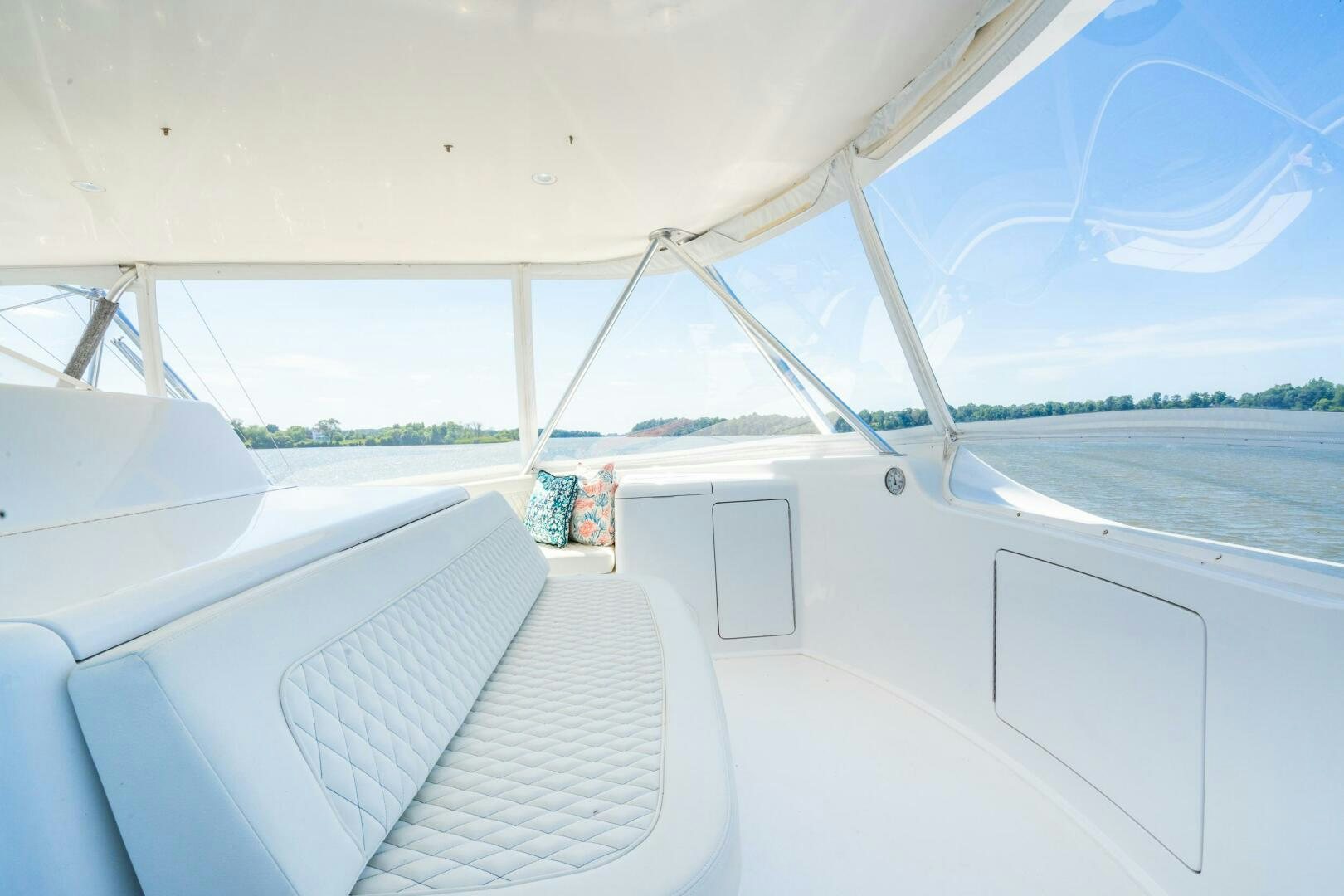 a white boat on the water aboard W Yacht for Sale