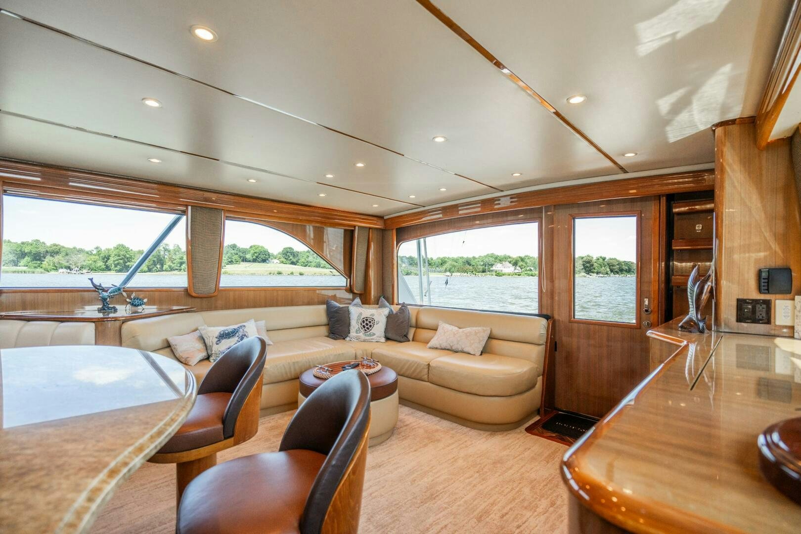 a living room with a large window aboard W Yacht for Sale