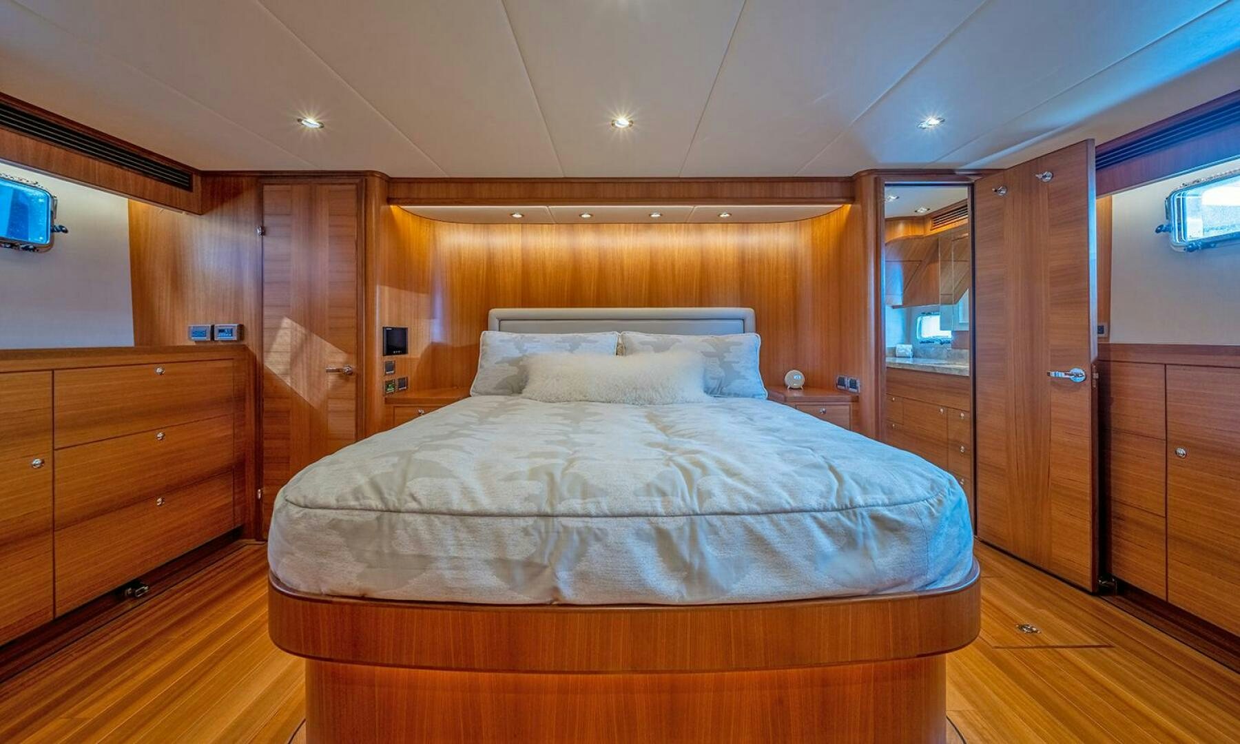 a bed in a room aboard OKIE Yacht for Sale