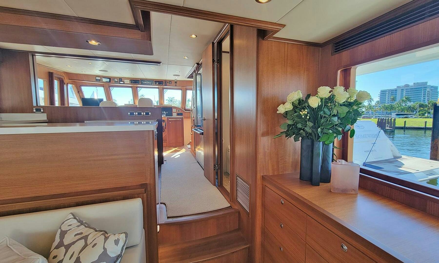 a room with a vase of flowers aboard OKIE Yacht for Sale