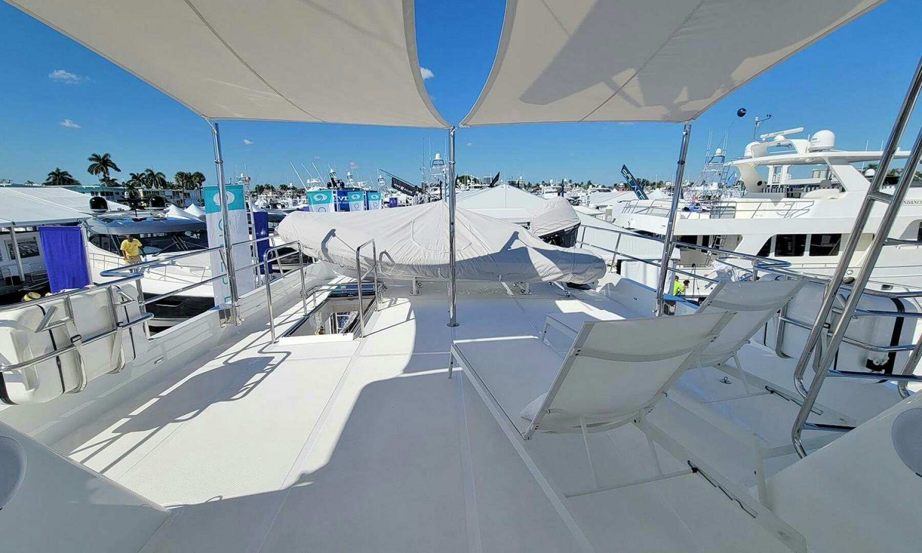 a row of white yachts aboard OKIE Yacht for Sale