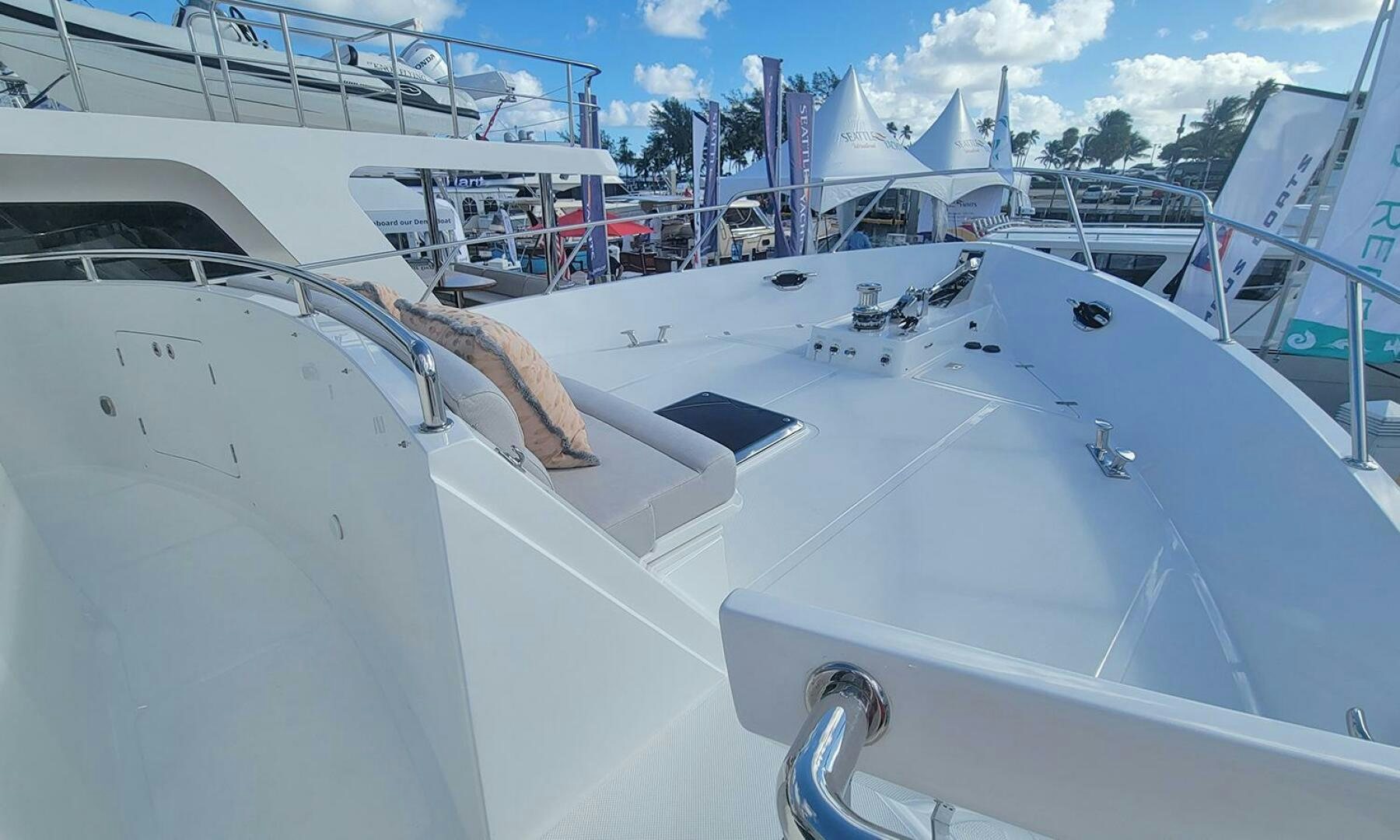 a group of white yachts aboard OKIE Yacht for Sale