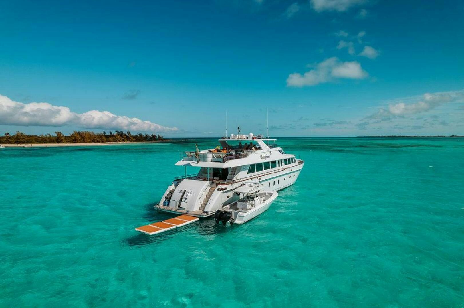 a boat in the water aboard BEACHFRONT Yacht for Sale