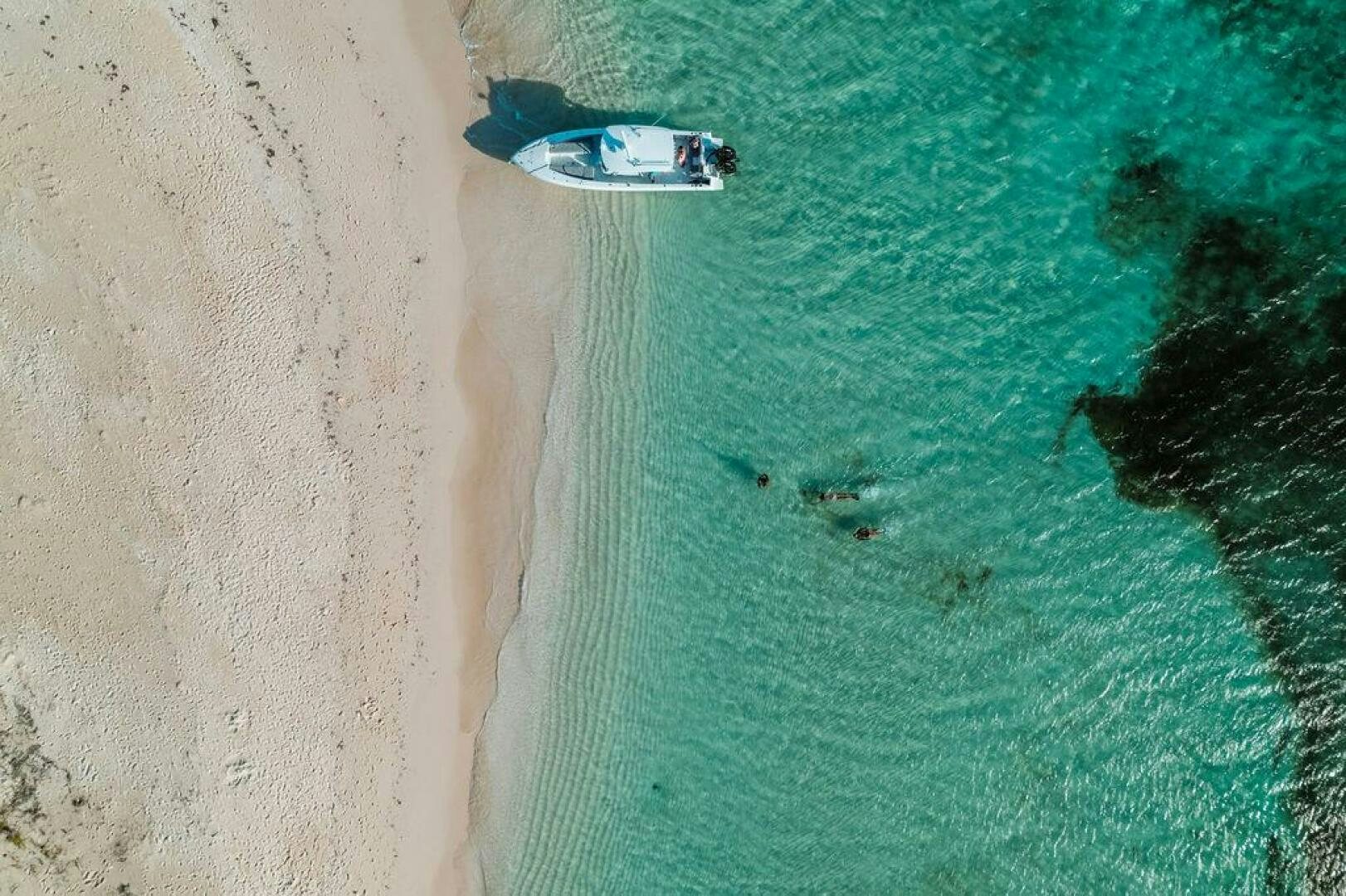 a person swimming in a pool aboard BEACHFRONT Yacht for Sale