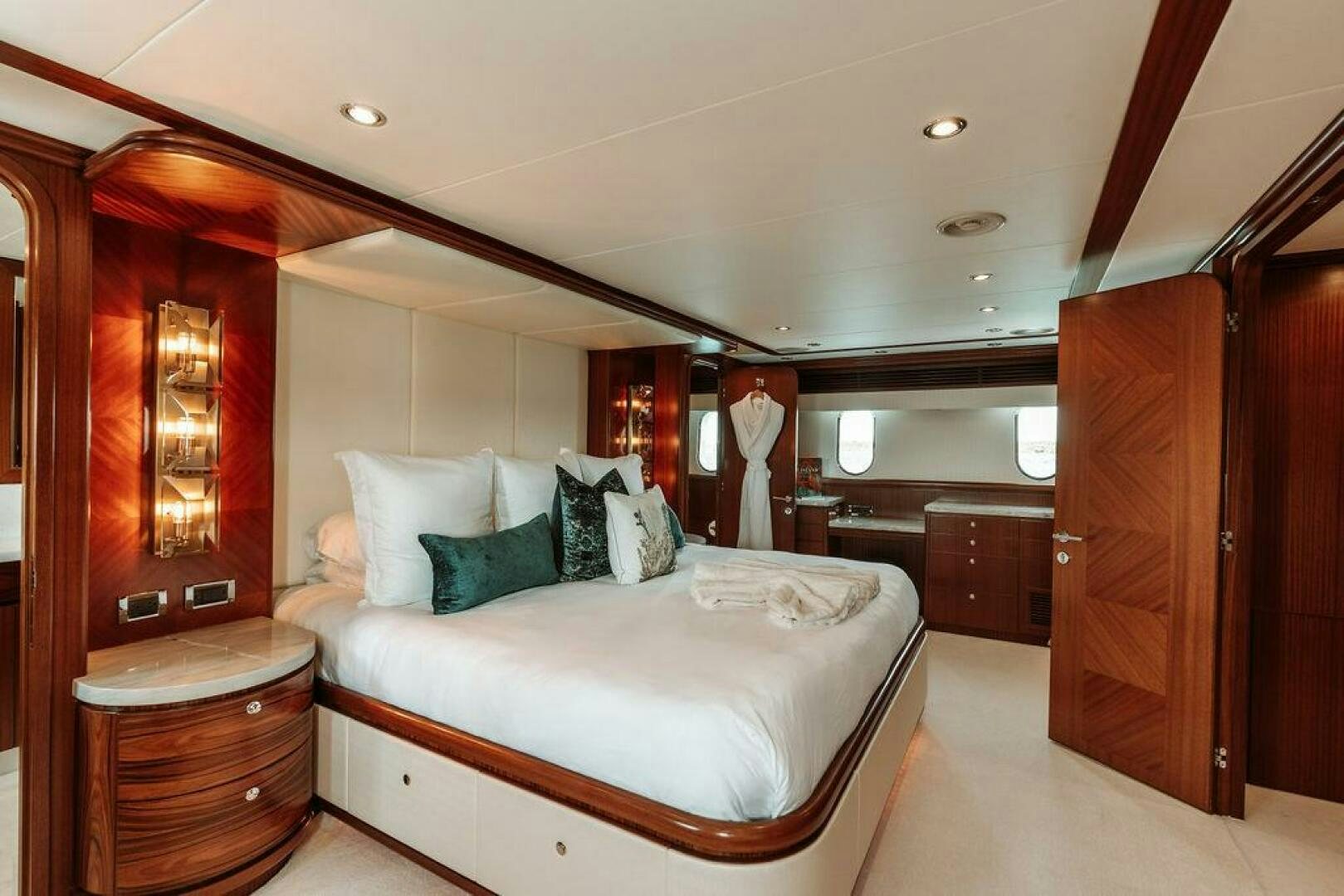 a bed in a room aboard BEACHFRONT Yacht for Sale