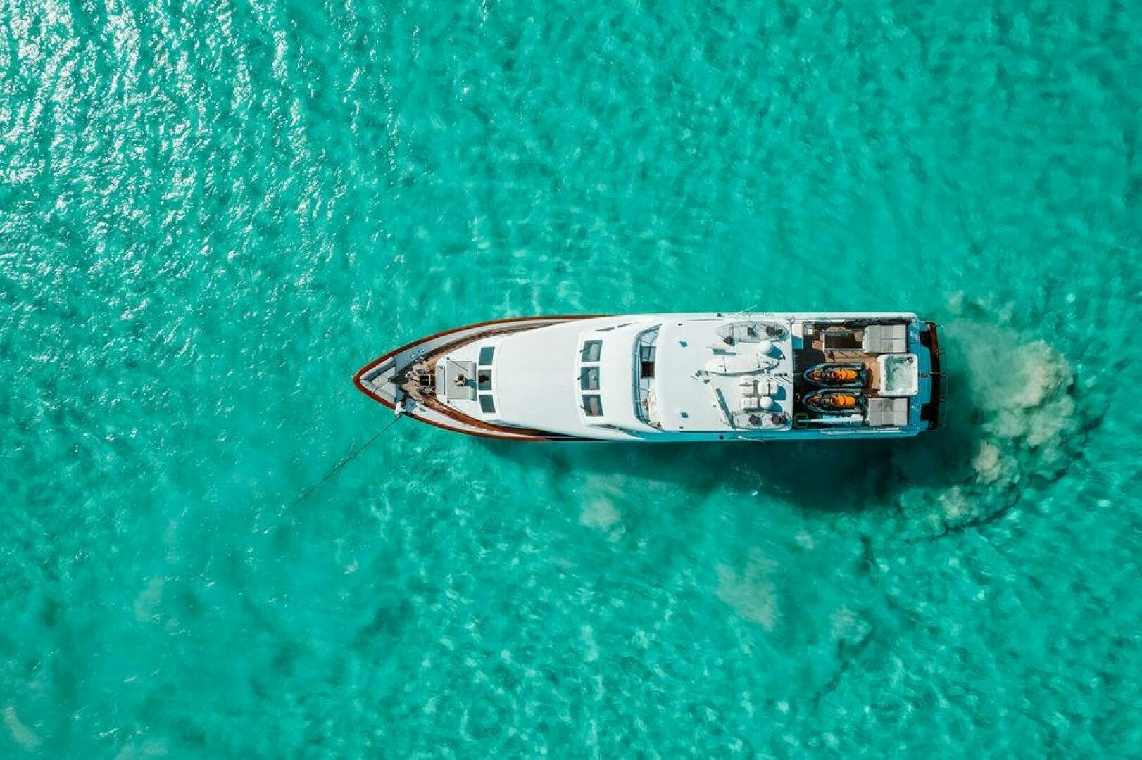 a small metal object on a green surface aboard BEACHFRONT Yacht for Sale