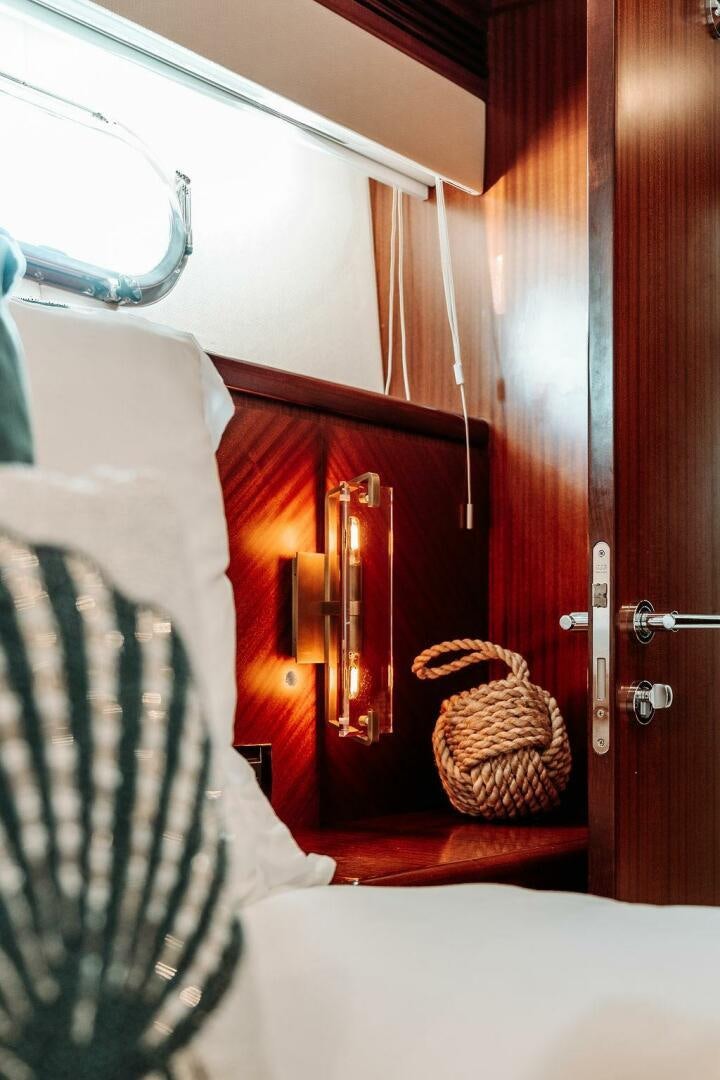 a chair with a basket on it aboard BEACHFRONT Yacht for Sale