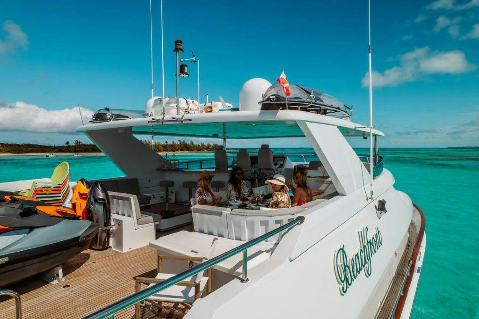 a group of people on a boat aboard BEACHFRONT Yacht for Sale