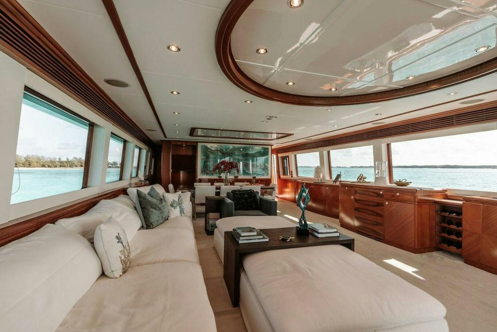 a large living room with a large window aboard BEACHFRONT Yacht for Sale