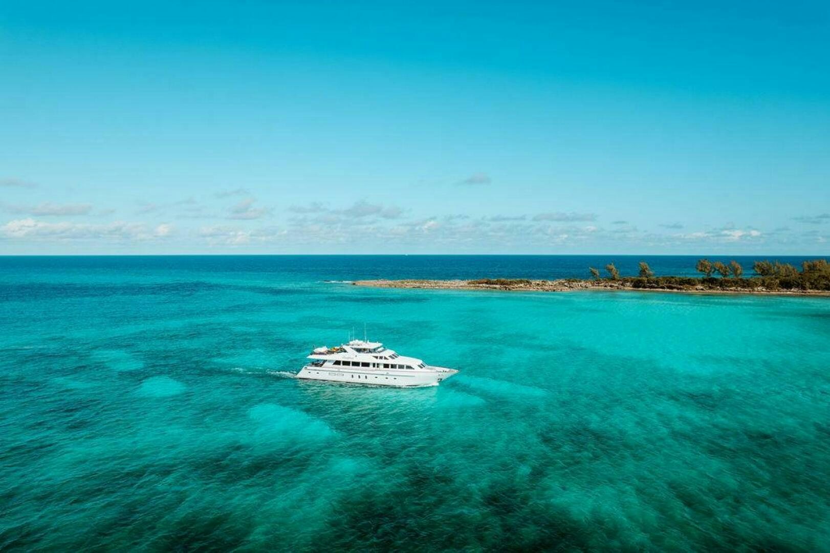 a boat in the water aboard BEACHFRONT Yacht for Sale