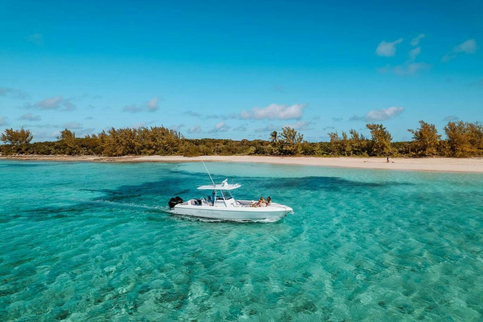a boat in the water aboard BEACHFRONT Yacht for Sale