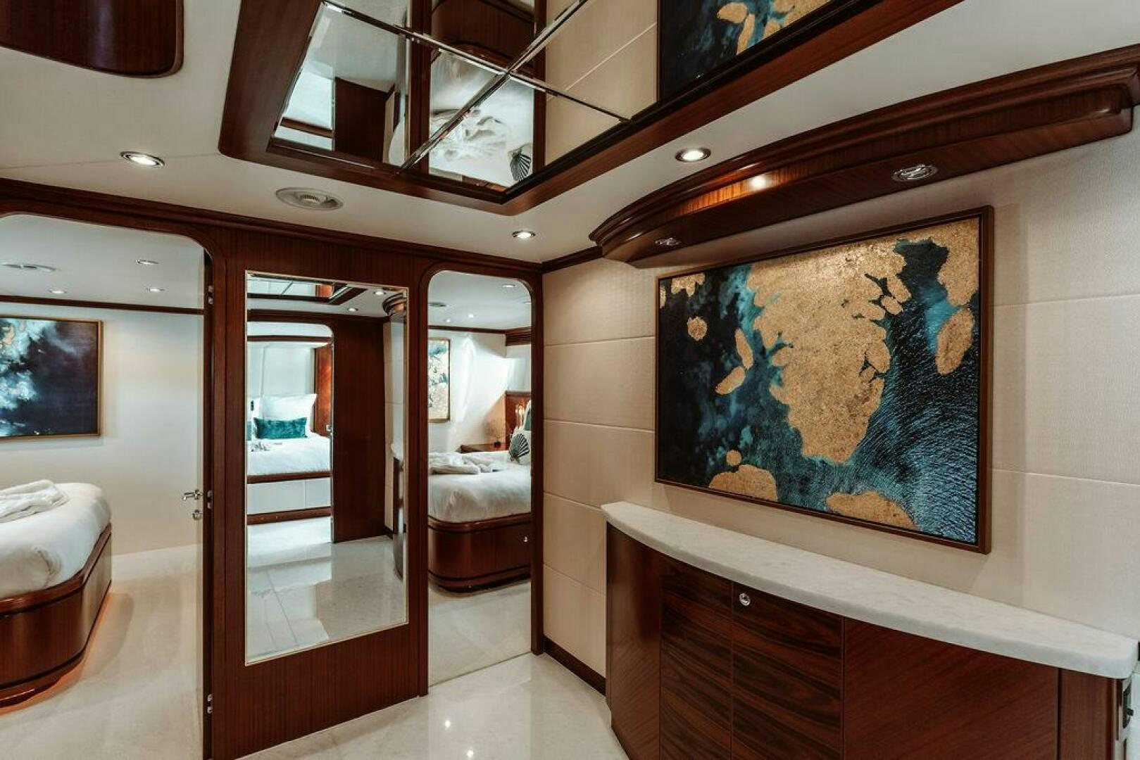 a room with a painting on the wall aboard BEACHFRONT Yacht for Sale